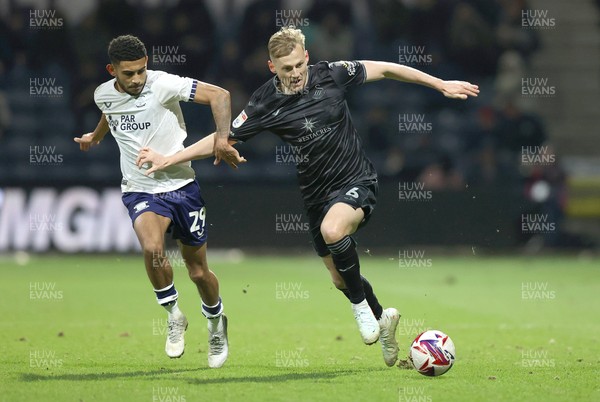 040325 - Preston North End v Swansea City - Sky Bet Championship - Harry Darling of Swansea and Kaine Kesler-Hayden of Preston North End