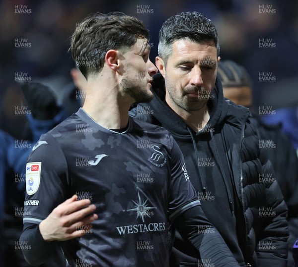 040325 - Preston North End v Swansea City - Sky Bet Championship - Liam Cullen of Swansea and Swansea manager Alan Sheehan at half time