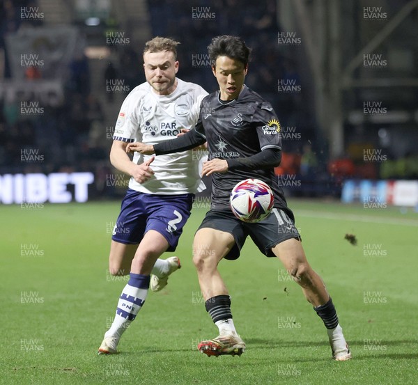 040325 - Preston North End v Swansea City - Sky Bet Championship - Eom Ji-sung of Swansea and Ryan Porteous of Preston North End