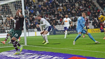 051125 - Preston North End v Swansea City - Sky Bet Championship - Josh Tymon of Swansea (L) reacts to having his shot saved