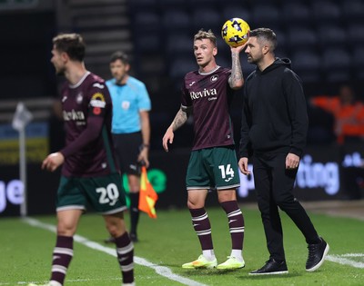 051125 - Preston North End v Swansea City - Sky Bet Championship - Swansea manager Alan Sheehan with Josh Tymon of Swansea on a throw in