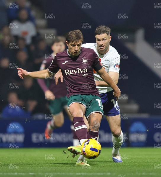 051125 - Preston North End v Swansea City - Sky Bet Championship - Goncalo Franco of Swansea and Andrew Hughes of Preston North End