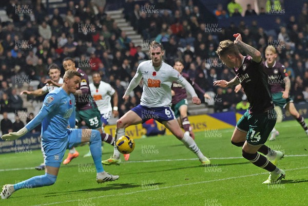 051125 - Preston North End v Swansea City - Sky Bet Championship - Goalkeeper Daniel Iverson of Preston North End saves the shot of Josh Tymon of Swansea