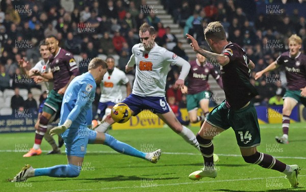 051125 - Preston North End v Swansea City - Sky Bet Championship - Goalkeeper Daniel Iverson of Preston North End saves the shot of Josh Tymon of Swansea
