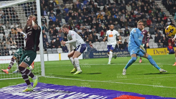 051125 - Preston North End v Swansea City - Sky Bet Championship - Josh Tymon of Swansea (L) reacts to having his shot saved