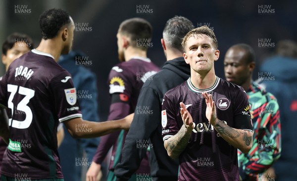 051125 - Preston North End v Swansea City - Sky Bet Championship - Ethan Galbraith of Swansea applauds the travelling fans at the end of the match