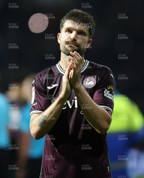051125 - Preston North End v Swansea City - Sky Bet Championship - Cameron Burgess of Swansea applauds the travelling fans at the end of the match