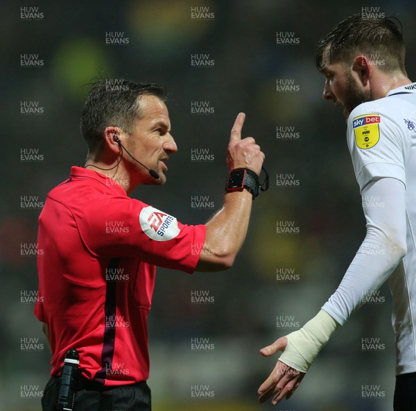 120119 - Preston North End v Swansea City - Sky Bet Championship - Referee KStroud has words with Tom Barkhuizen of Preston North End   