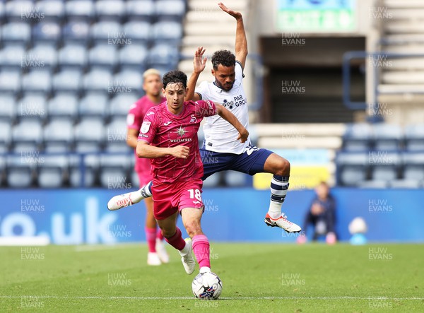 260823 - Preston North End v Swansea City - Sky Bet Championship - Charlie Patino of Swansea and Duane Holmes of Preston North End