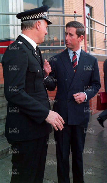 301193 - Picture shows Prince Charles with Chief Superintendent Arthur Jones from the Gwent Constabulary during his visit to Newport Central Police station