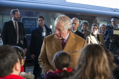 071218 - Picture shows HRH Prince Charles arriving in Cardiff at Central Station - Charles greets local children