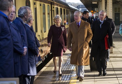 071218 - Picture shows HRH Prince Charles on the steam train after arriving in Cardiff at Central Station - Charles meets the engine crew