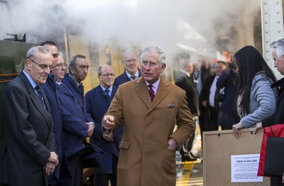 071218 - Picture shows HRH Prince Charles on the steam train after arriving in Cardiff at Central Station - Charles meets the engine crew