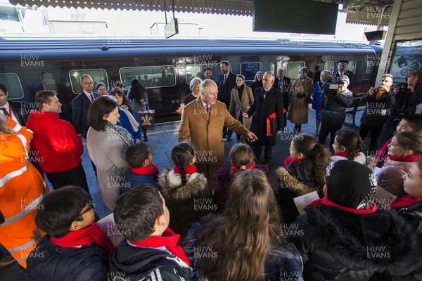071218 - Picture shows HRH Prince Charles arriving in Cardiff at Central Station - Charles greets local children