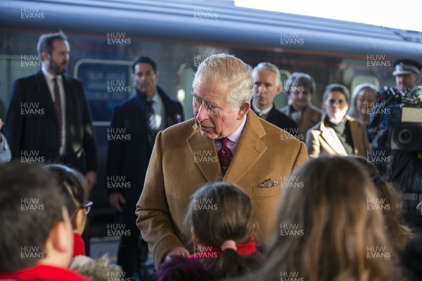 071218 - Picture shows HRH Prince Charles arriving in Cardiff at Central Station - Charles greets local children