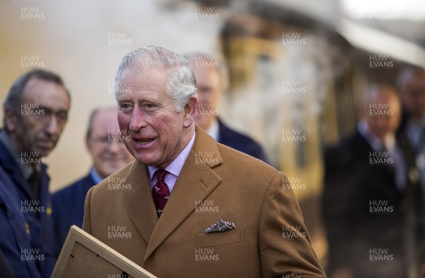 071218 - Picture shows HRH Prince Charles on the steam train after arriving in Cardiff at Central Station - Charles meets the engine crew