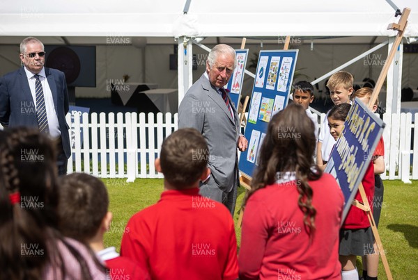 090721 - Prince Charles, the Prince of Wales meets school children from St Peters Primary during his visit to  Glamorgan County Crickets ground Sophia Gardens in Cardiff this morning