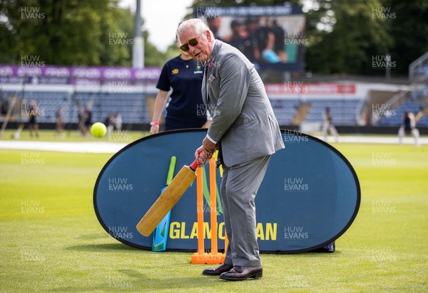 090721 - Prince Charles, the Prince of Wales has a go at batting during his visit to Glamorgan County Crickets ground Sophia Gardens in Cardiff this morning