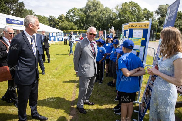090721 - Prince Charles, the Prince of Wales speaks to school children during his visit Glamorgan County Crickets ground Sophia Gardens in Cardiff this morning