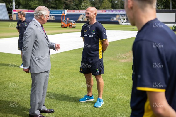 090721 - Prince Charles, the Prince of Wales speaks to Head Coach Matthew Maynard during his visit Glamorgan County Crickets ground Sophia Gardens in Cardiff this morning