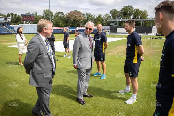 090721 - Prince Charles, the Prince of Wales speaks to Captain Chris Cooke during his visit Glamorgan County Crickets ground Sophia Gardens in Cardiff this morning