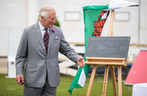 090721 - Prince Charles, the Prince of Wales unveils a plaque for Glamorgan 100th anniversary as a first class club during his visit to Glamorgan County Crickets ground Sophia Gardens in Cardiff this morning