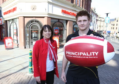 08.04.10 ... Pic from WRU -  Principality Player of the Month, March 2010, Andrew Coombs of Newport RFC at the Newport branch of the Principality with Branch Manager Claire Ellis 