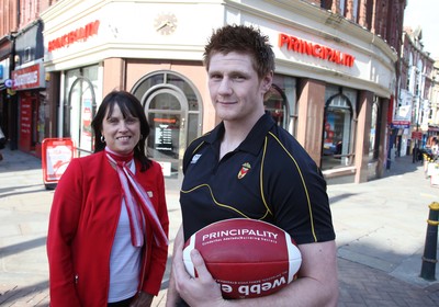 08.04.10 ... Pic from WRU -  Principality Player of the Month, March 2010, Andrew Coombs of Newport RFC at the Newport branch of the Principality with Branch Manager Claire Ellis 