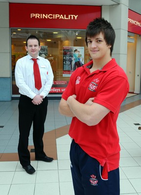 17.02.10-WRU Principality Player of the Month. Llanelli RFC  Dale Ford at the Llanelli Branch of the Principality Building Society, with Dean Roberts (customer advisor). 