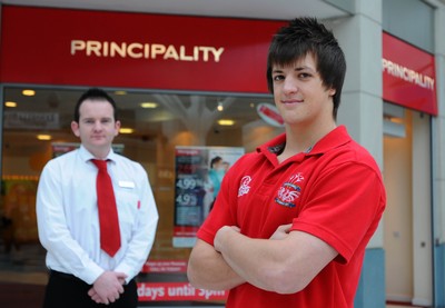 17.02.10-WRU Principality Player of the Month. Llanelli RFC  Dale Ford at the Llanelli Branch of the Principality Building Society, with Dean Roberts (customer advisor). 