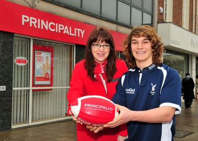 240212- WRU-Principality Player of the MonthJoe Tomalin-Reeves of Swansea RFC, WRU-Principality Premiership Player of the Month, with Rhian Davis, Senior Branch Manager, Principality Building Society, Swansea