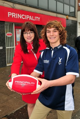 240212- WRU-Principality Player of the MonthJoe Tomalin-Reeves of Swansea RFC, WRU-Principality Premiership Player of the Month, with Rhian Davis, Senior Branch Manager, Principality Building Society, Swansea