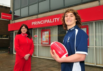 240212- WRU-Principality Player of the MonthJoe Tomalin-Reeves of Swansea RFC, WRU-Principality Premiership Player of the Month, with Rhian Davis, Senior Branch Manager, Principality Building Society, Swansea