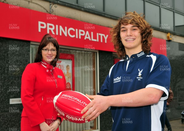 240212- WRU-Principality Player of the MonthJoe Tomalin-Reeves of Swansea RFC, WRU-Principality Premiership Player of the Month, with Rhian Davis, Senior Branch Manager, Principality Building Society, Swansea