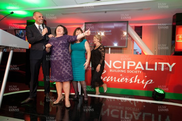 280513 - WRU Principality Premiership Awards Dinner - Jason Mohammed chats to some of the Kitchen Ladies from Aberavon RFC after they won the Unsung Heroes Award