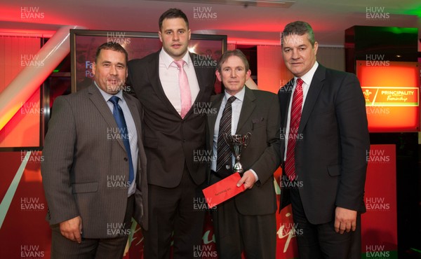 280513 - WRU Principality Premiership Awards Dinner - WRU Chairman David Pickering, right, and Jason Newsway, Principality's Head of Intermediary Sales, left, present Pontypridd RFC's captain Chris Dicomidis and Chief Executive Steve Reardon, with The Fair Play Award