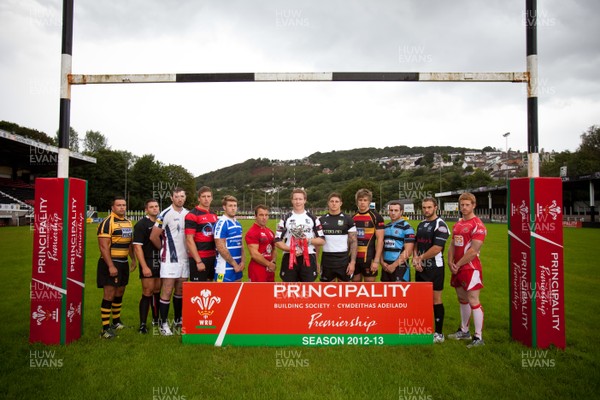 290812 - WRU Principality Premiership Launch, Pontypridd - Representatives of the teams in the 2012-13 WRU Principality Premiership at the launch at Pontypridd RFC Left to right - Gethin Robinson of Newport; Aled Williams of Neath; Sam Kiley of Swansea; Sam Williams of Aberavon; Jonathon Vaughan of Bridgend; Craig Hawkins of Llanelli; Dan Godfrey of Pontypridd; Ross Wardle of Bedwas; Jason Harries of Carmarthen Quins; Shaun Powell of Cardiff; Rob Nash of Cross Keys and Lloyd Phillips of Llandovery