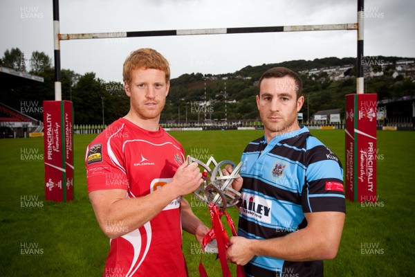 290812 - WRU Principality Premiership Launch, Pontypridd - Representatives of the teams in the 2012-13 WRU Principality Premiership at the launch at Pontypridd RFC Lloyd Phillips of Llandovery and Shaun Powell of Cardiff whose teams meet in the first round of matches