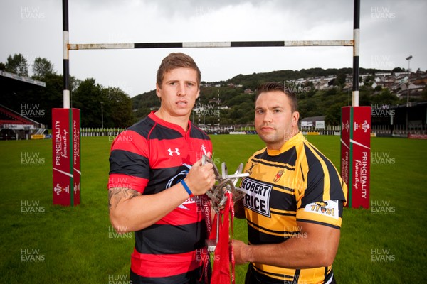 290812 - WRU Principality Premiership Launch, Pontypridd - Representatives of the teams in the 2012-13 WRU Principality Premiership at the launch at Pontypridd RFC Sam Williams of Aberavon and Gethin Robinson of Newport whose teams meet in the first round of matches