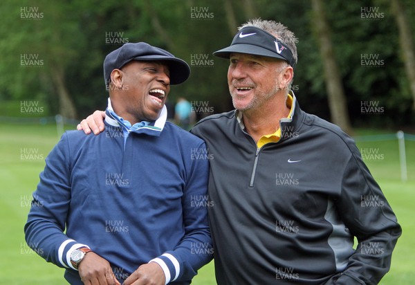 220513 - BMW PGA Golf ChampionshipPro-Celebrity Event - Ian Wright shares a laugh with Sir Ian Botham