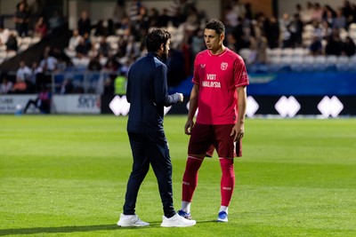 020926 - Queens Park Rangers v Cardiff City - Sky Bet Championship - Brian Barry-Murphy manager of Cardiff City gives instructions to Yousef Salech of Cardiff City