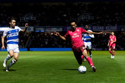 020926 - Queens Park Rangers v Cardiff City - Sky Bet Championship - Calum Scanlon of Cardiff City is challenged by Koki Saito of Queens Park Rangers