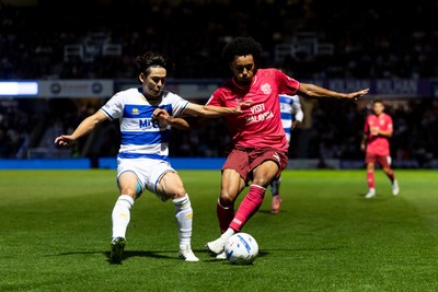 020926 - Queens Park Rangers v Cardiff City - Sky Bet Championship - Calum Scanlon of Cardiff City is challenged by Koki Saito of Queens Park Rangers