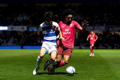 020926 - Queens Park Rangers v Cardiff City - Sky Bet Championship - Calum Scanlon of Cardiff City is fouled by Koki Saito of Queens Park Rangers