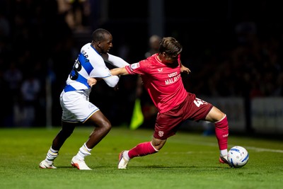 020926 - Queens Park Rangers v Cardiff City - Sky Bet Championship - Cian Ashford of Cardiff City is challenged by Glen Kamara of Queens Park Rangers