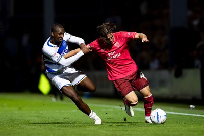 020926 - Queens Park Rangers v Cardiff City - Sky Bet Championship - Cian Ashford of Cardiff City is challenged by Glen Kamara of Queens Park Rangers