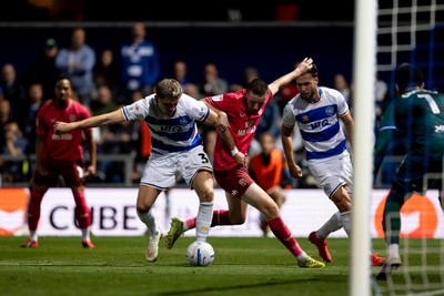 020926 - Queens Park Rangers v Cardiff City - Sky Bet Championship - Jimmy Dunne of Queens Park Rangers and Jack Moylan of Cardiff City battle for the ball