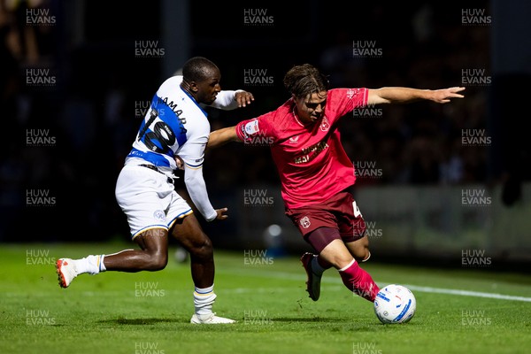 020926 - Queens Park Rangers v Cardiff City - Sky Bet Championship - Cian Ashford of Cardiff City is challenged by Glen Kamara of Queens Park Rangers