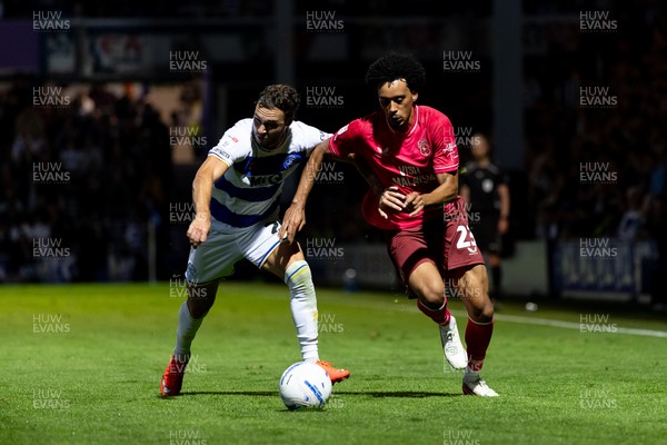 020926 - Queens Park Rangers v Cardiff City - Sky Bet Championship - Calum Scanlon of Cardiff City and Harvey Vale of Queens Park Rangers battle for the ball 