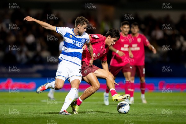 020926 - Queens Park Rangers v Cardiff City - Sky Bet Championship - Rubin Colwill of Cardiff City is challenged by Nicolas Madsen of Queens Park Rangers 